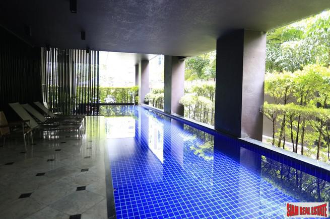 Noble Reveal Condominium | Two Bedroom Corner Condo with Wrap Around Windows and Fantastic City Views in Ekkamai